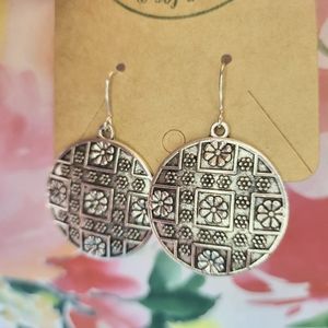 Round silver dangle earrings with flower detail
